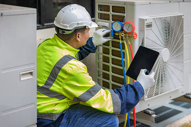 Professional Ac Installation technician working in Tioga, ND